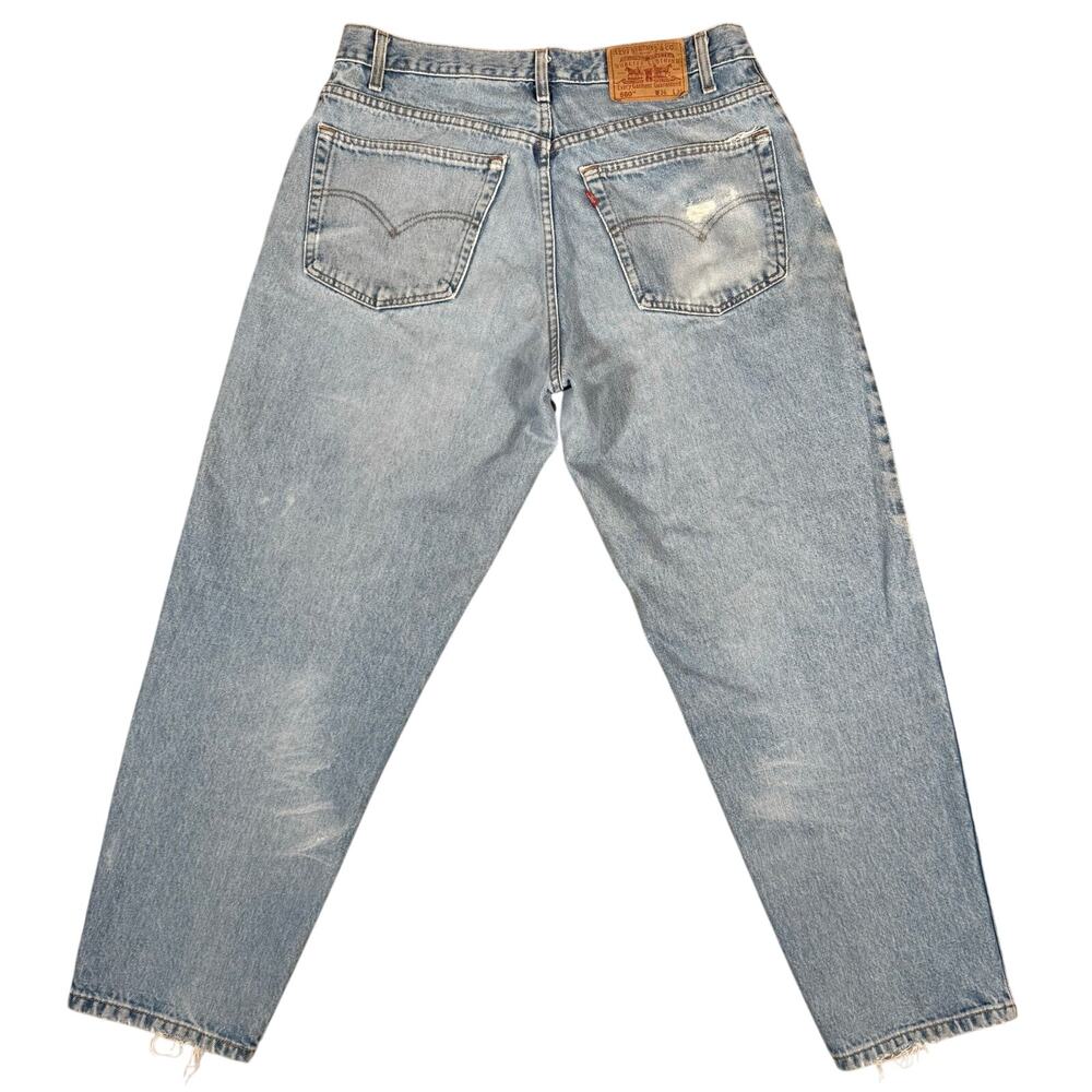 Vintage 90s Levi’s 560 Loose Fit Tapered Leg Jeans Light Wash Distressed 36x29